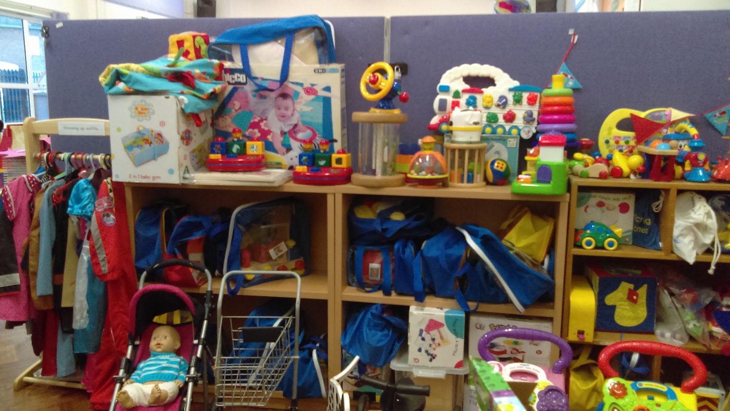 Volunteers organizing educational toys for children